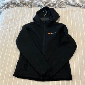 Storm black zip hoodie with orange accent